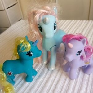 3  little Ponies light blue purple blue